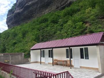 Фото номера Односпальная кровать в общем номере для мужчин и женщин Отель Hotel on Pirosmani г. Chiatʼura 15