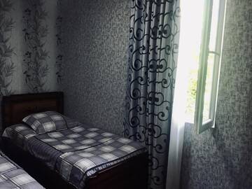 Фото номера Двухместный номер с 2 отдельными кроватями Гостевой дом Butichi Guest House г. Chiatʼura 8