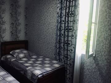 Фото номера Двухместный номер с 2 отдельными кроватями Гостевой дом Butichi Guest House г. Chiatʼura 3